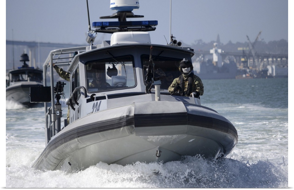 San Diego, California, May 14, 2013 - Sailors conduct training in small boat defensive tactics in San Diego Bay. The Coast...