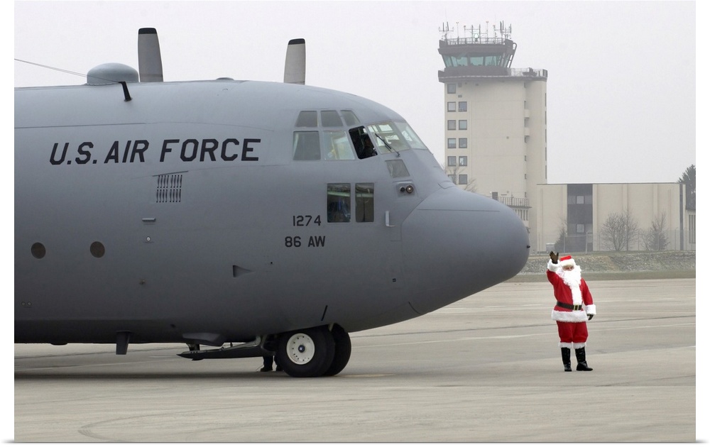 Ramstein Air Base, Germany, December 12, 2004 - Santa arrives by a C-130 Hercules.
