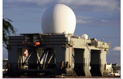 Sea Based Xband Radar dome modeled by the setting sun at Pearl Harbor naval shipyard
