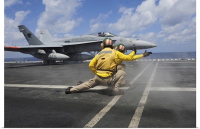 Shooters Give The Signal To Launch An F/A-18C Hornet