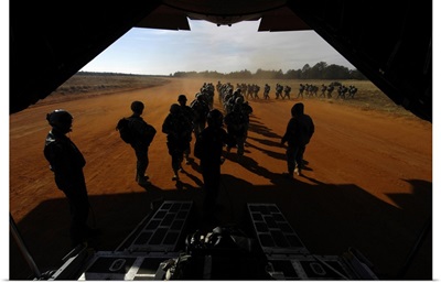 Soldiers Board A C-130 Hercules During Operation Toy Drop