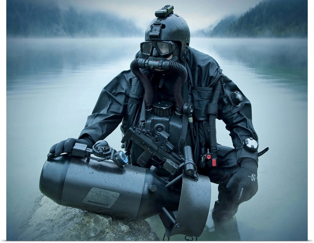 Special operations forces combat diver with underwater propulsion vehicle.