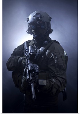 Special operations forces soldier equipped with night vision and an HK416 assault rifle