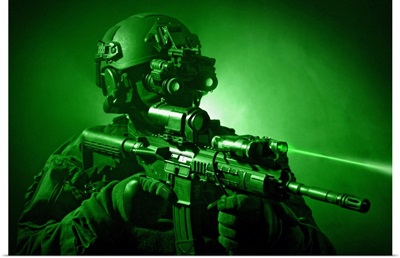 Special operations forces soldier equipped with night vision and an HK416 assault rifle