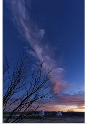 Strange cloud over observatories at sunset