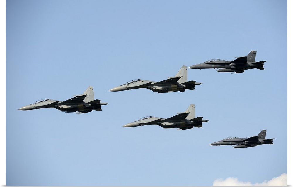 Sukhoi Su-30 MKM aircraft and F/A-18 Hornet jets of the Royal Malaysian Air Force.