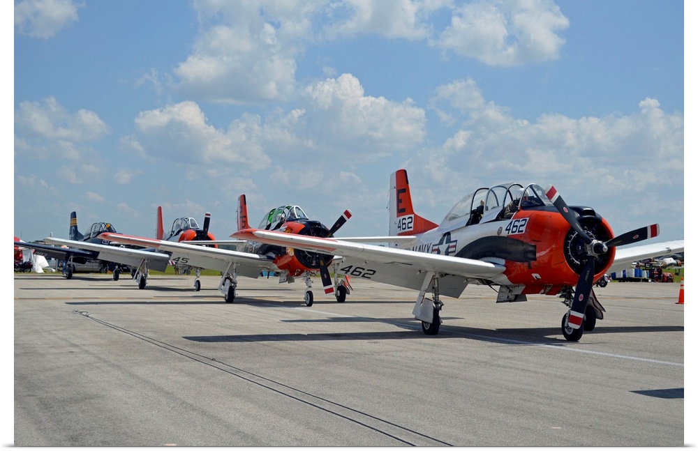 T-28C Trojan aircraft lined up on the flight line after a successful aerobatic showing.