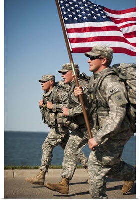 The 191st Military Police Company  carrying the American Flag