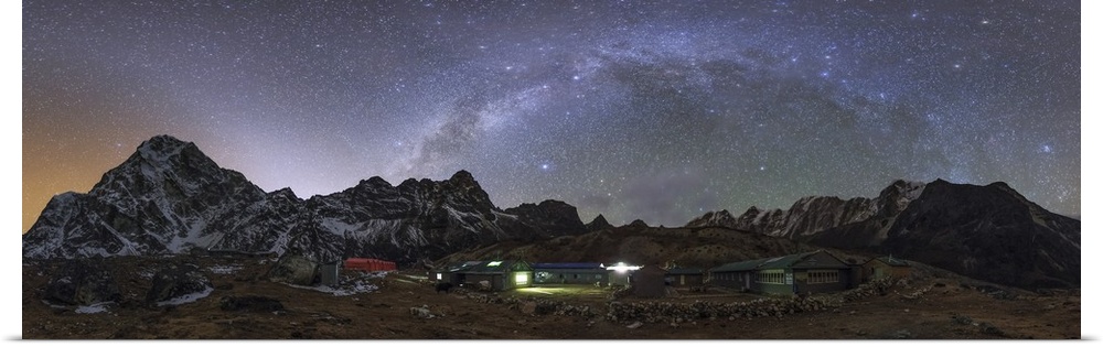 The arch of the Milky Way galaxy and bright zodiacal light band appear over this 360 degree view of Himalayas in the world...