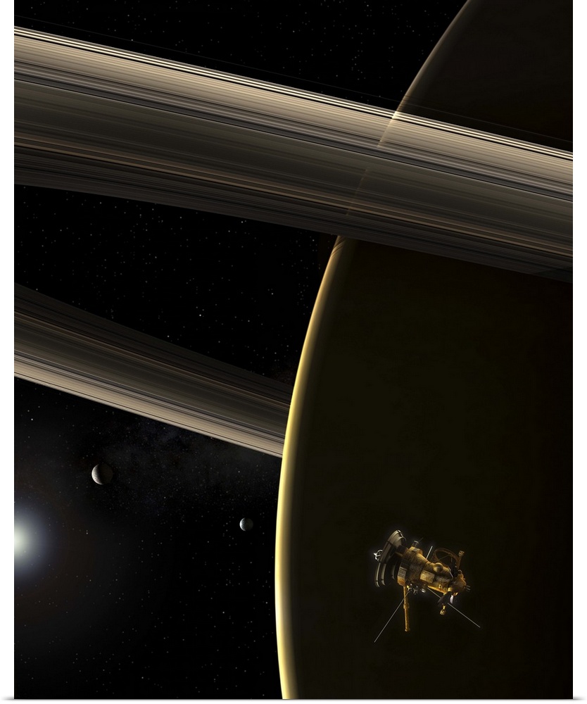 The Cassini spacecraft witnesses a shrunken sun break over Saturn. Saturn's rings and two of its moons are also visible.