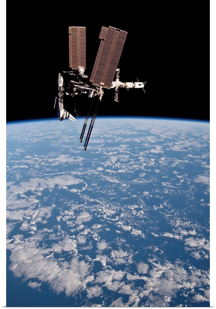 May 23, 2011 - The International Space Station and docked Space Shuttle Endeavour, backdropped by Earth and the blackness ...