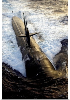 The Los Angelesclass submarine USS Albuquerque surfaces in the Atlantic Ocean