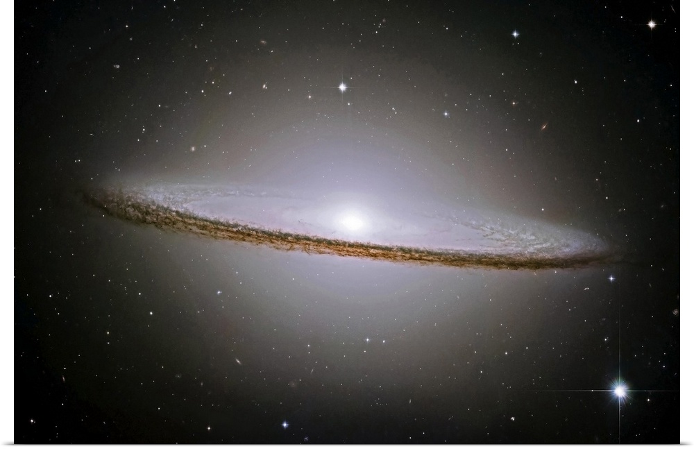 Landscape, oversized wall hanging of the Sombrero Galaxy radiating a halo of light, surrounded by stars.