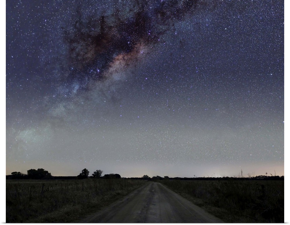 The center of the Milky Way galaxy over a rural road in Mercedes, Argentina.
