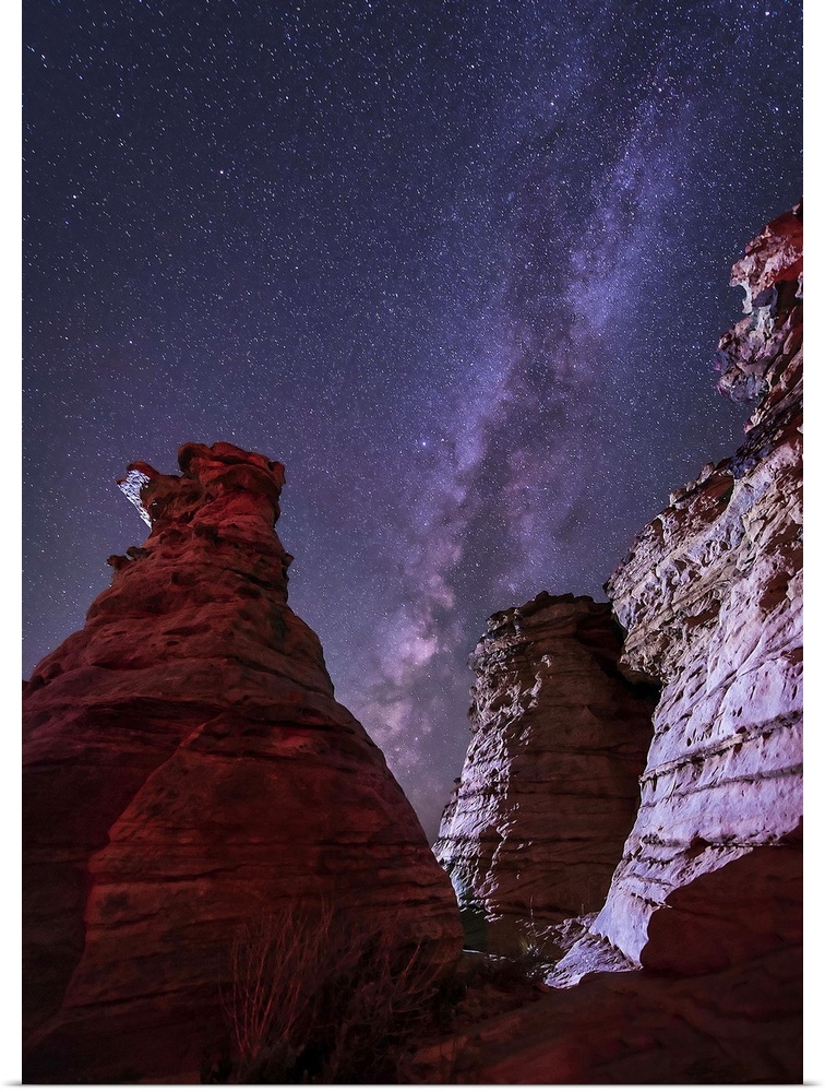 The Milky Way rises above the Wedding Party rock formation in the Black Mesa area of Oklahoma.