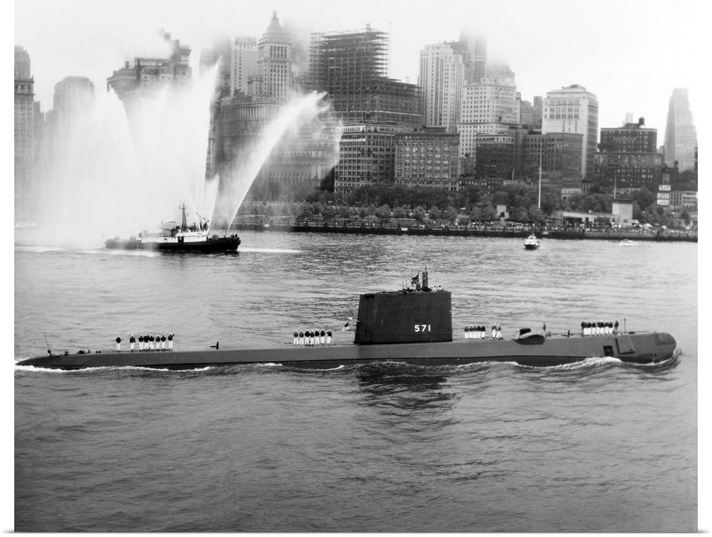 The nuclear submarine USS Nautilus anchored in New York Harbor in 1958, with the skyline of downtown Manhattan in the back...