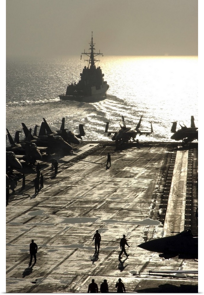 The Spanish Navy frigate Alvaro de Bazan pulls away from aircraft carrier USS Theodore Roosevelt.