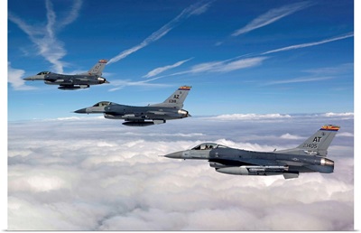 Three F-16s fly in formation during a training mission over Arizona