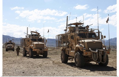 Three U.S. Army Mine Resistant Ambush Protected vehicles