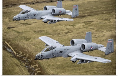 Two A-10 Thunderbolt II's conduct a training mission over Arkansas