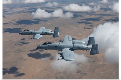 Two A-10 Thunderbolts fly over the Saylor Creek bombing range, Idaho