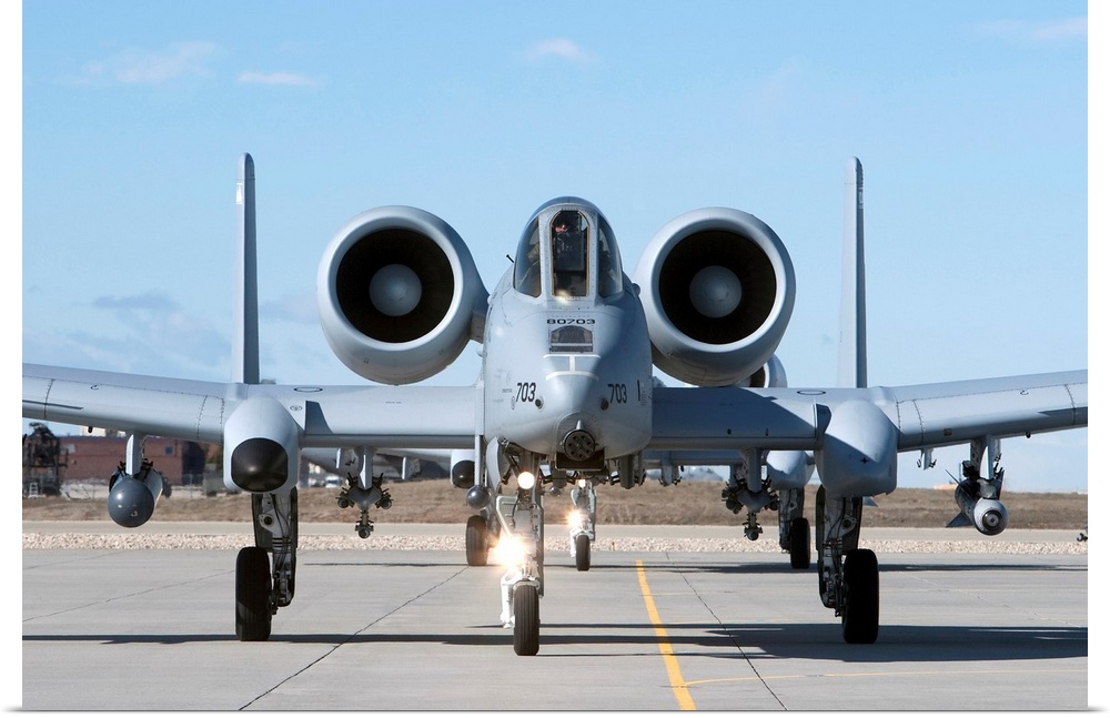 Two A-10 Thunderbolt's from the 190th Fighter Squadron taxi to the runway on a training mission out of Boise, Idaho.