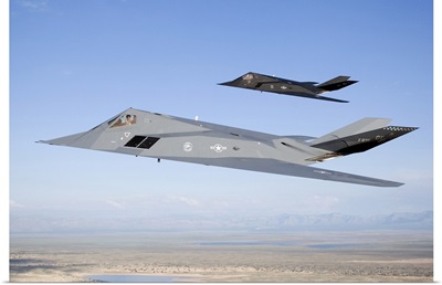 Two F-117 Nighthawk stealth fighters in flight over New Mexico