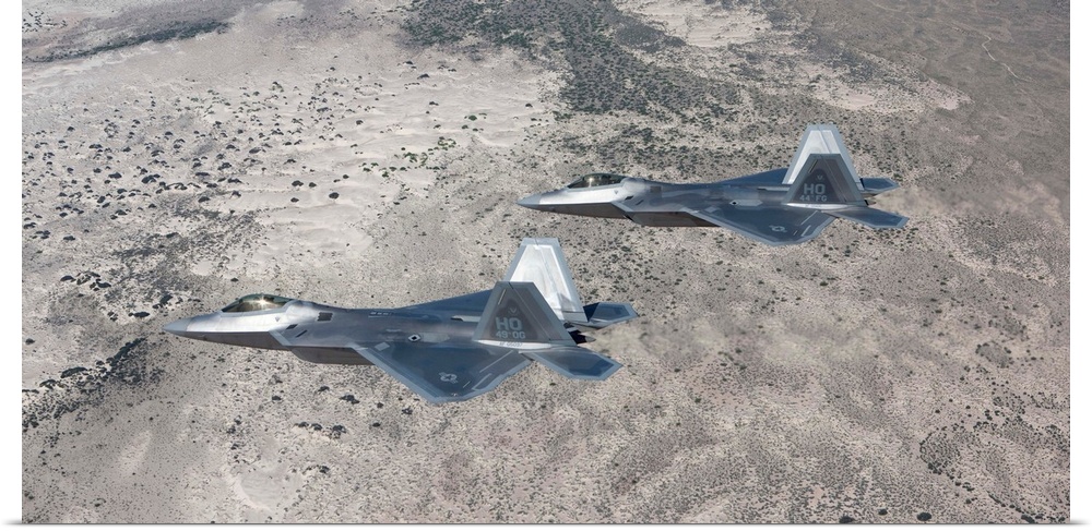 Two F-22 Raptors from the 49th Fighter Wing flies in formation on a training mission out of Holloman Air Force Base, New M...
