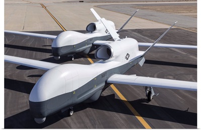 Two MQ-4C Triton unmanned aerial vehicles on the tarmac