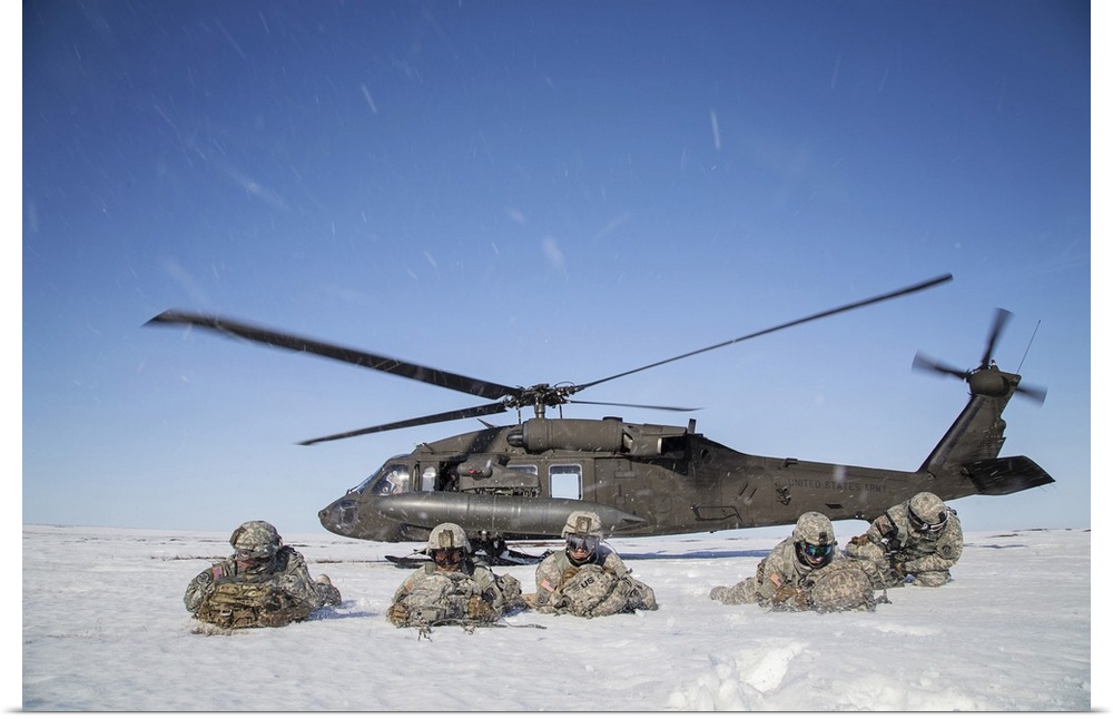 May 2, 2014 - U.S. Army paratroopers pull security after exiting a UH-60 Black Hawk helicopter during exercise Arctic Pega...