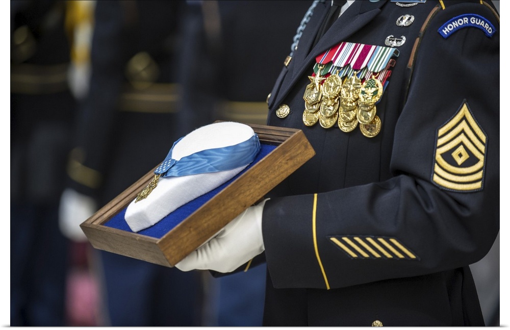 September 22, 2013 - U.S. Army Sergeant holds the Medal of Honor during an Enshrinement Ceremony at the Smithsonian Nation...