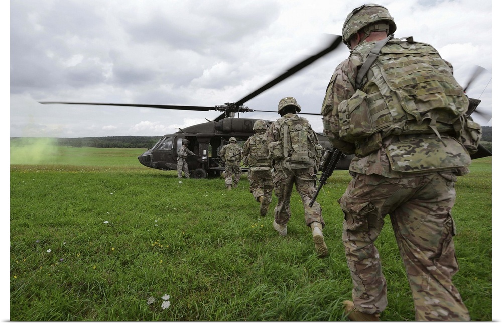 August 13, 2013 - U.S. Army soldiers board a UH-60 Black Hawk helicopter at the Joint Multinational Training Command's (JM...