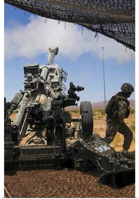 U.S. Marines fire an M777 howitzer
