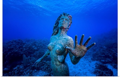 Underwater mermaid statue at Grand Cayman island