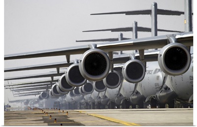 US Air Force C17 Globemaster IIIs lined up on the runway awaiting takeoff