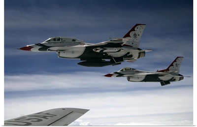 US Air Force F-16 aircraft fly off the wing of a KC-135 Stratotanker