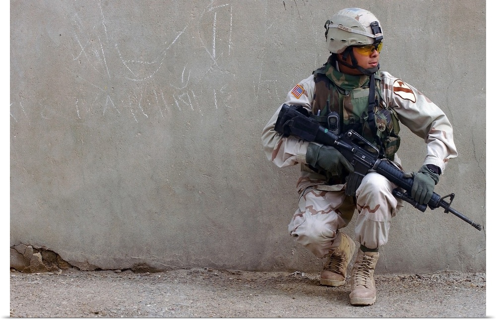 U.S. Army soldier armed with a 5.56mm M16A2.