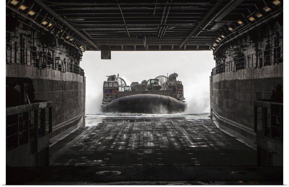 March 9, 2013 - U.S. Navy landing craft air cushion enters the well deck of the USS Green Bay (LPD 20) in the Arabian Sea.