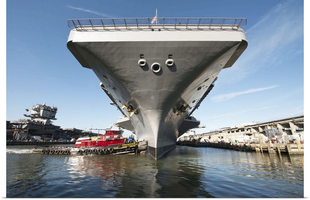 Newport News, Virginia, August 25, 2013 - The aircraft carrier USS Theodore Roosevelt (CVN-71) pulls out of Newport News S...