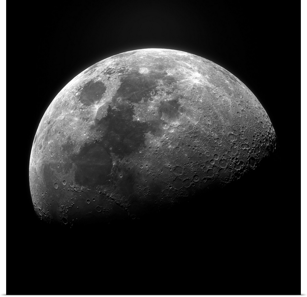 Clear photograph of one of the moon's phases showing well-defined craters, fading to the shadowy dark side.