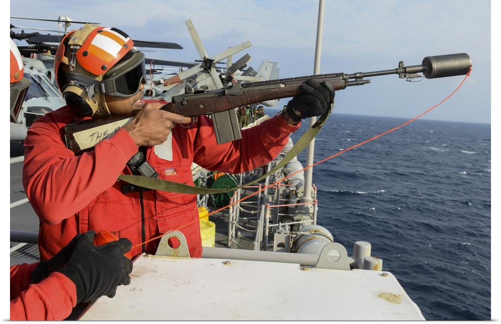 East China Sea, February 5, 2015 - Weapons officer aboard the amphibious assault ship USS Bonhomme Richard (LHD 6), prepar...