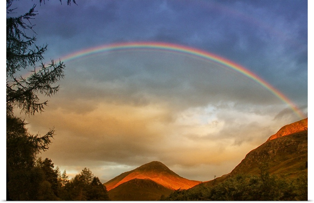 A stunning rainbow over the mountains of Glencoe, Scotland.