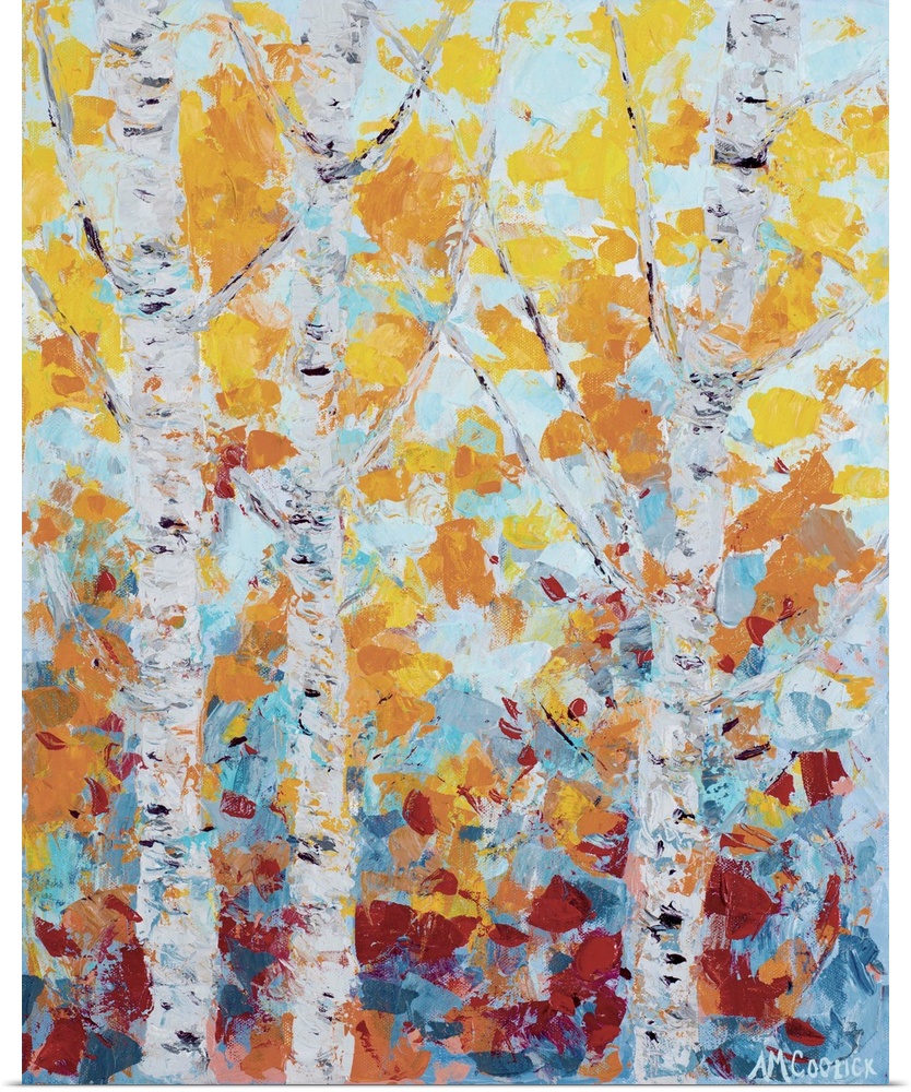 Three white aspen trees with fall leaves.
