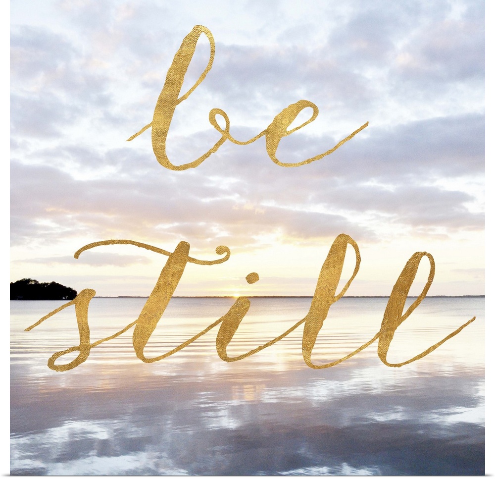 "Be Still" hand written in gold letters over an image of the sea at dawn.