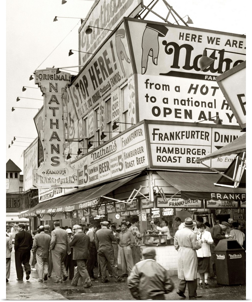 A crowd outside of Nathan's Famous in Coney Island, Brooklyn, New York. Photograph by Al Ravenna, 1954.