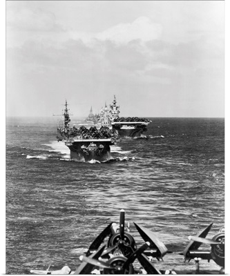A fleet of aircraft carriers led by USS Langley, 1944