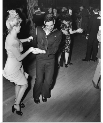 A sailor and his girlfriend dance the Jitterbug at the Hurricane in New York City, 1943
