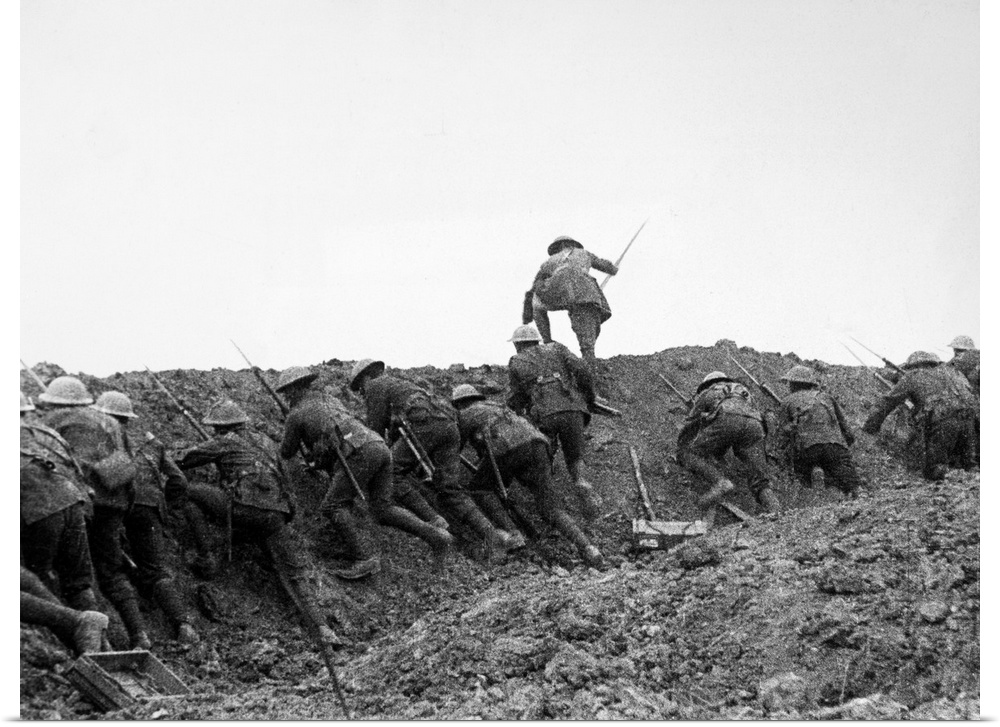 Allied troops 'going over the top,' or advancing over their own trench during the Battle of the Somme. Photograph, 1916.