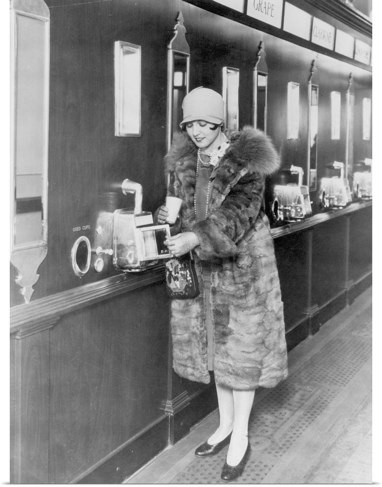 America, Automat, C1925. A Young Woman Getting A Beverage From An Automatic Dispensing Machine At An 'Automat' Restaurant,...