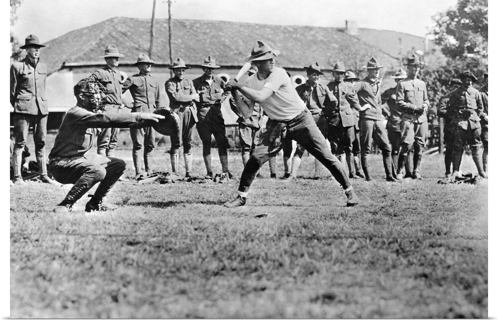 American soldiers playing baseball in Europe during World War I, with equipment donated by the Y.M.C.A. Photograph, c1917.